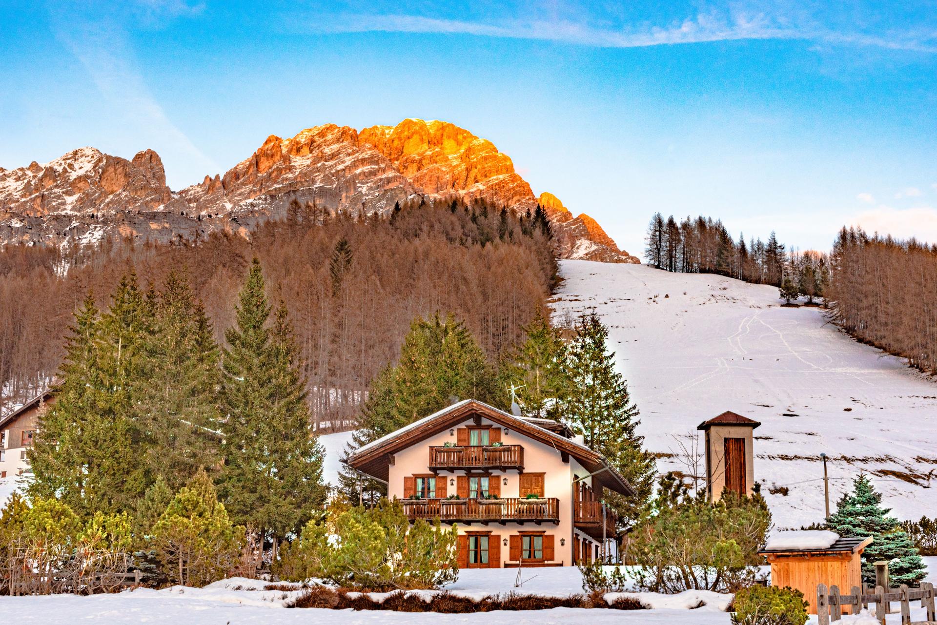Italy-Chalet-sunny-snow-forest