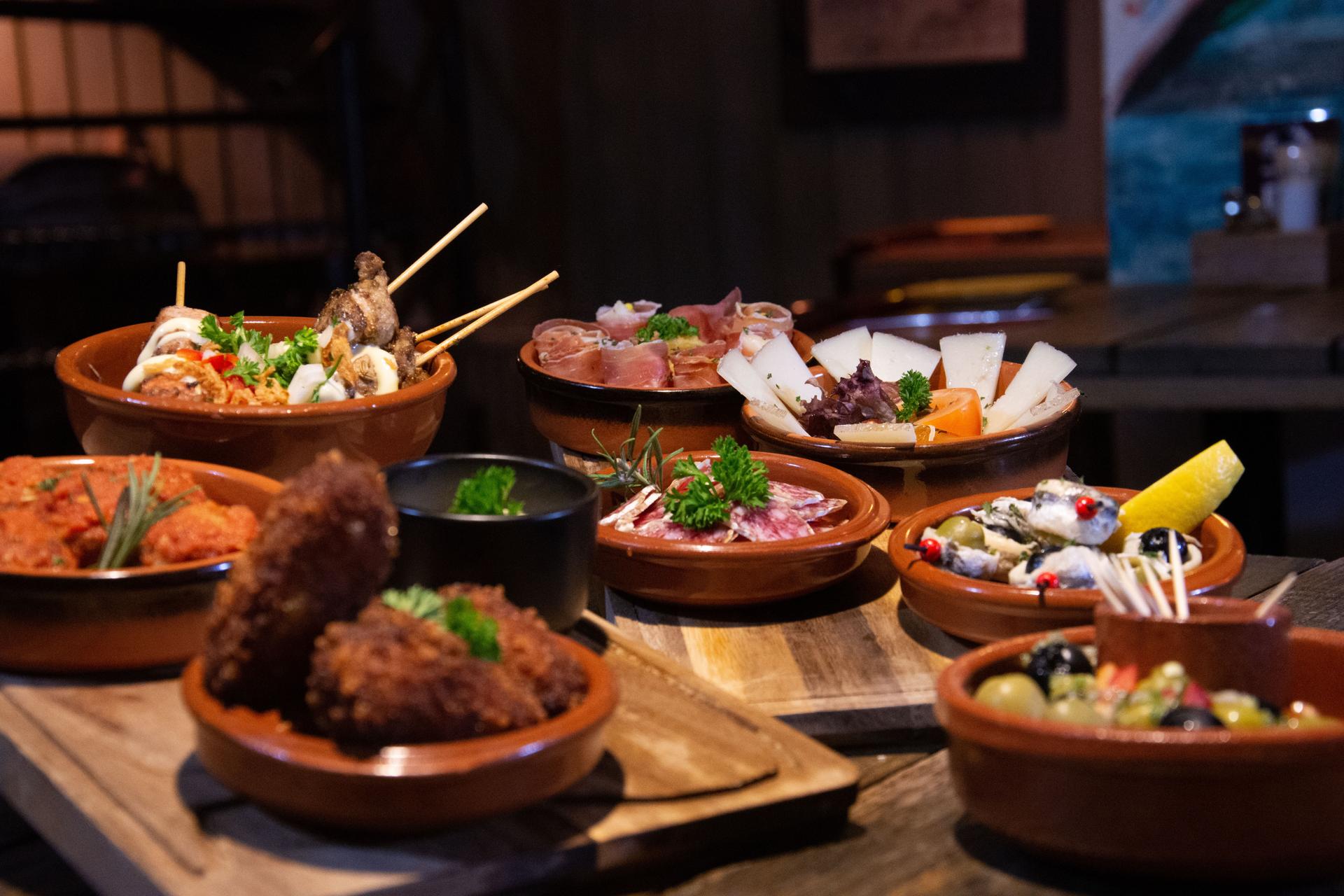 Spanish taps spread at spanish ski resort on holiday